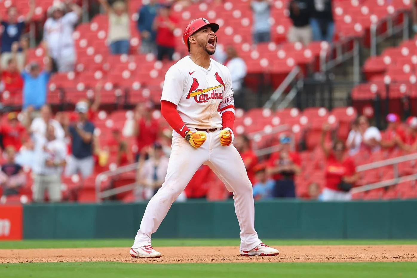 Willson Contreras celebrates after a hit with the St. Louis Cardinals amid MLB trade news