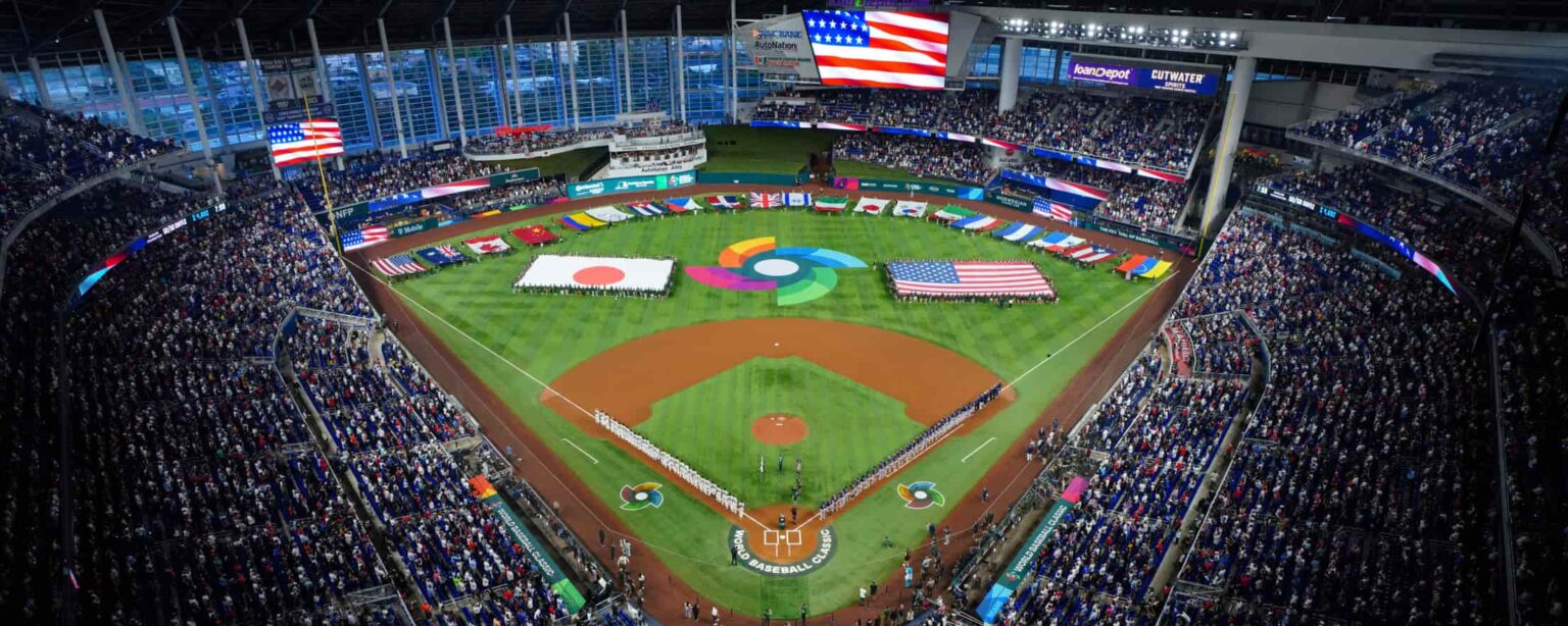 World Baseball Classic opening ceremony at loanDepot Park with international flags displayed on the field and a sold-out crowd