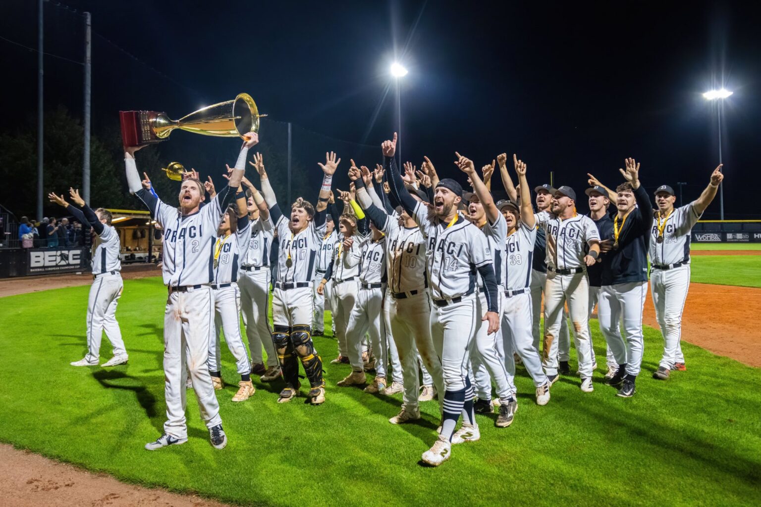 Draci Brno players celebrating the 2025 Czech Extraliga title, marking the final season with Arnošt Dubový, Filip Moštěk and Jan Vašourek