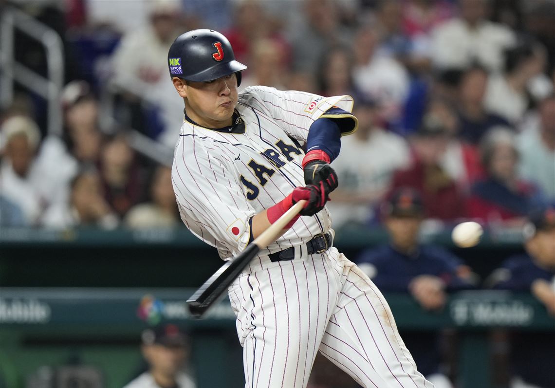 Munetaka Okamoto batting for Japan during an international baseball game before signing with the Toronto Blue Jays