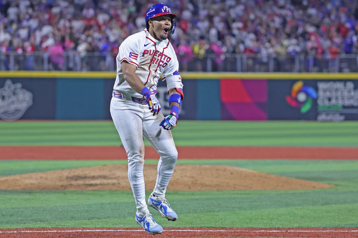 Darell Hernaiz celebrates after hitting a walk-off home run for Puerto Rico against Panama in the 10th inning of the 2026 World Baseball Classic in San Juan
