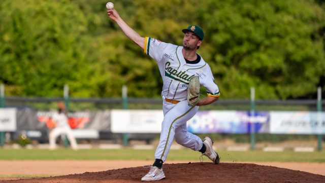 A1_07072-scaled-e1785060158709-640×361 Bonn Capitals pitcher delivers a pitch during a Deutsche Baseball Liga game.