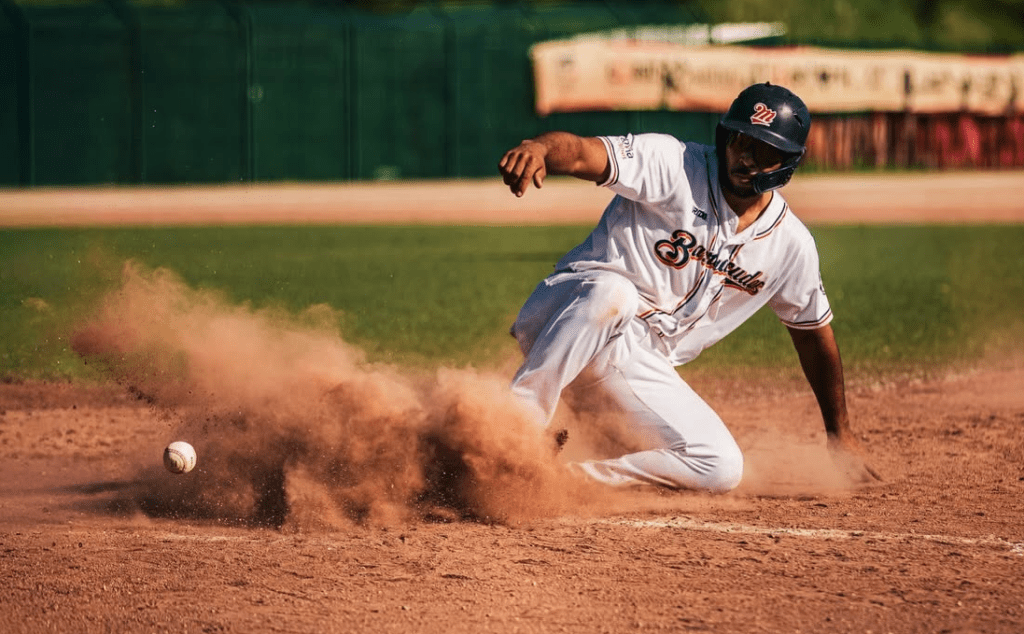 Montpellier Barracudas Base Runner – French Division 1 Baseball Montpellier Barracudas player slides into a base during a French Division 1 baseball game in the 2026 season.