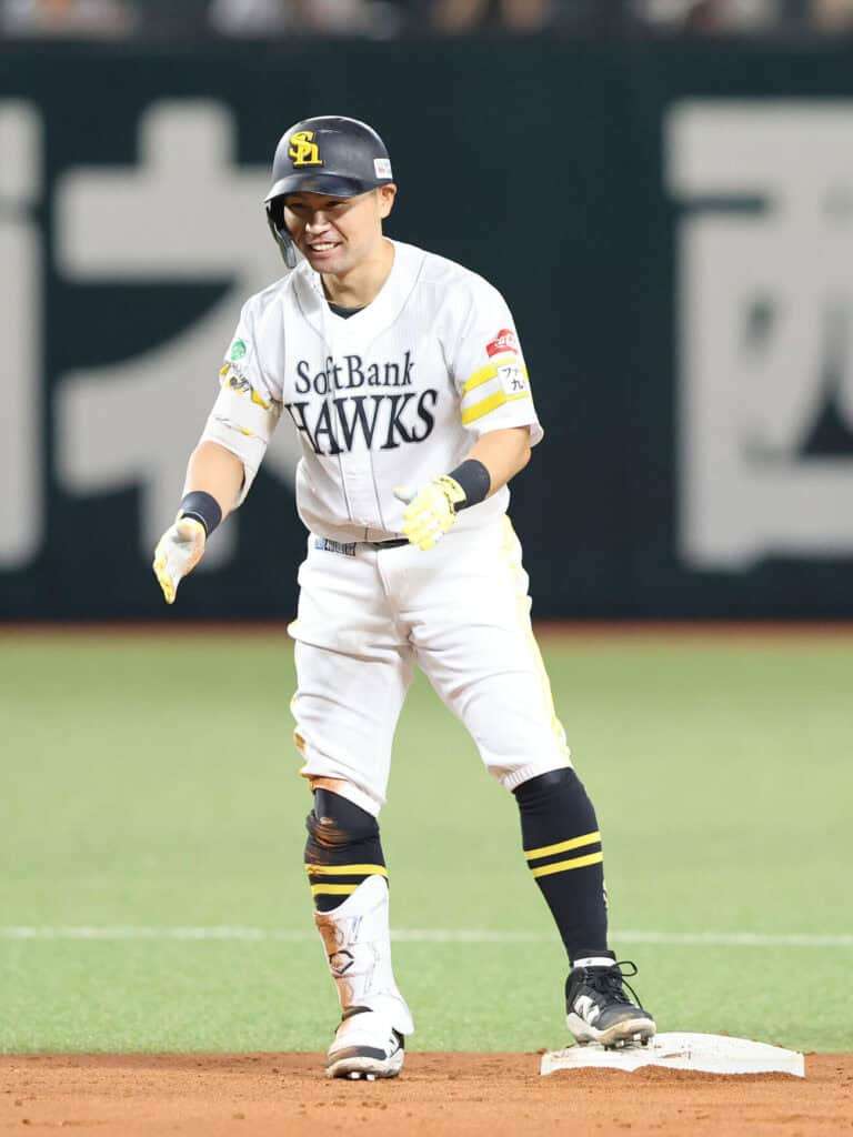 Akira Nakamura smiles at second base after doubling for the Fukuoka SoftBank Hawks against Orix on September 27, 2026