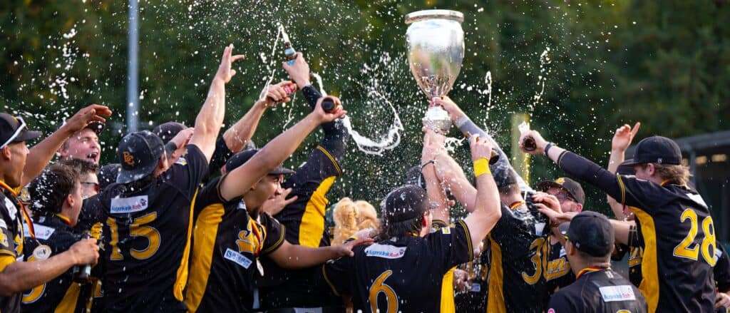 Bonn Capitals players raise the championship trophy and celebrate their 2026 Deutsche Baseball Liga title