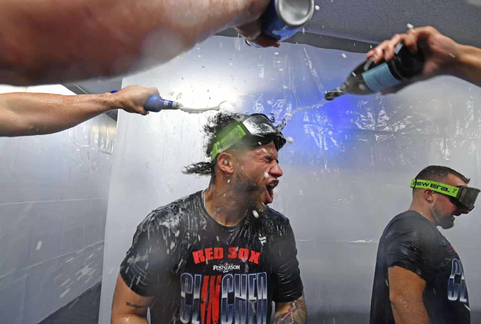 Boston Red Sox players celebrate after clinching a 2026 American League Wild Card playoff berth at Tropicana Field