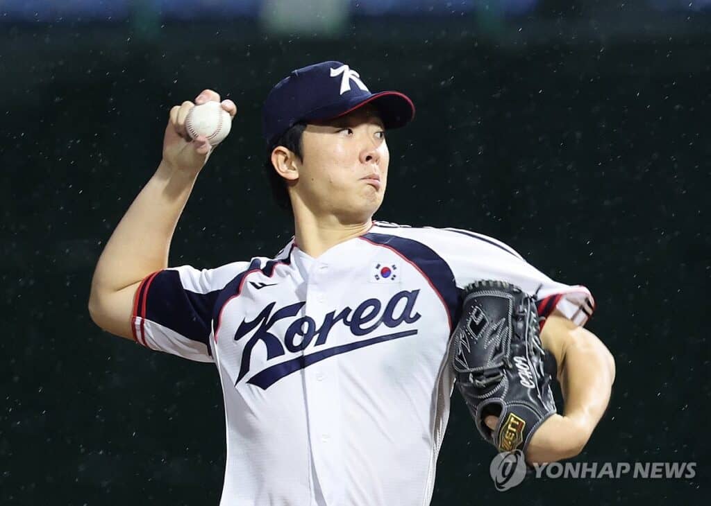 South Korea pitcher Choi Min-seok delivers against China during the 2026 Asian Games Super Round