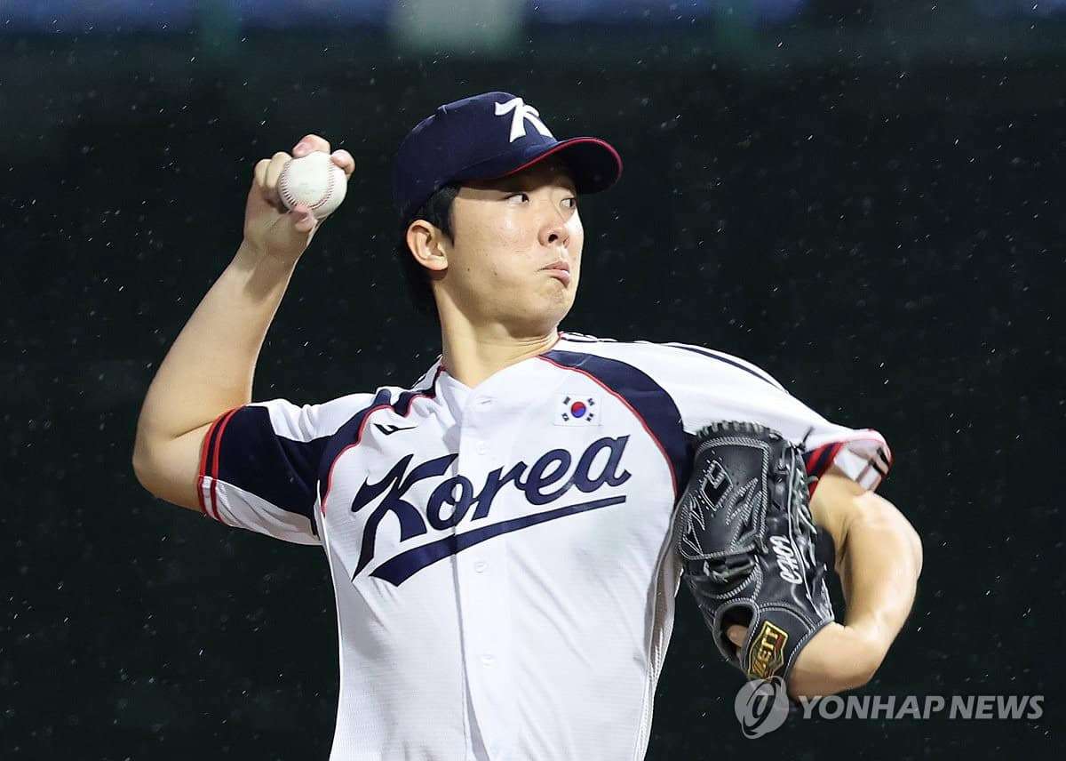 South Korea pitcher Choi Min-seok delivers against China during the 2026 Asian Games Super Round
