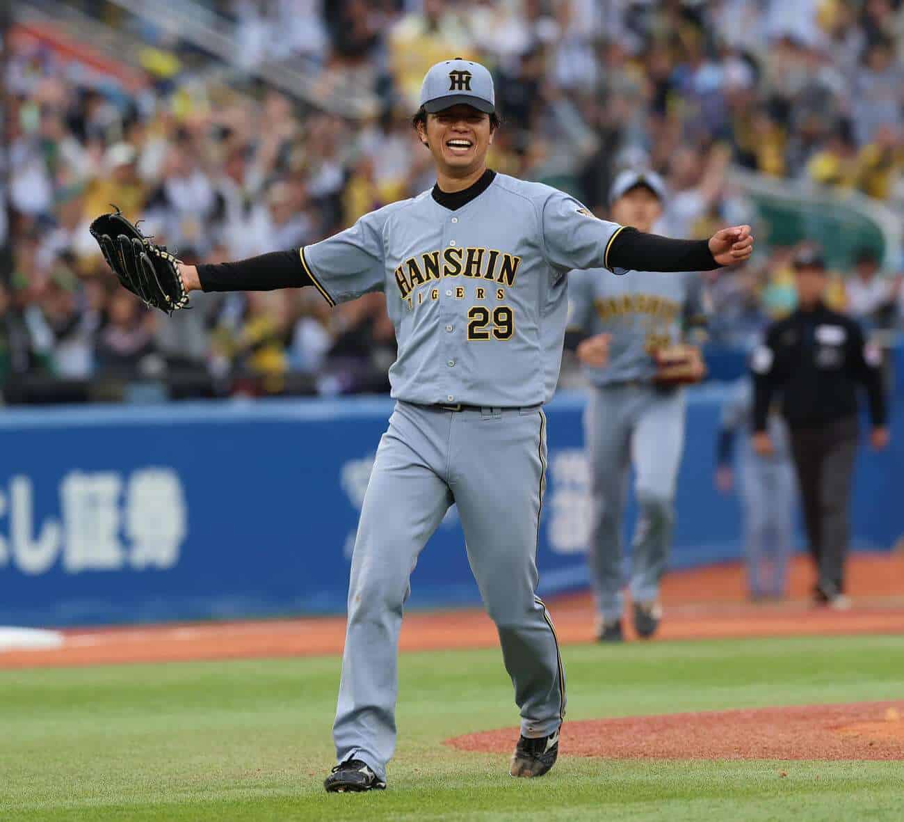 Haruto Takahashi celebrates on the mound for the Hanshin Tigers during the 2026 NPB season