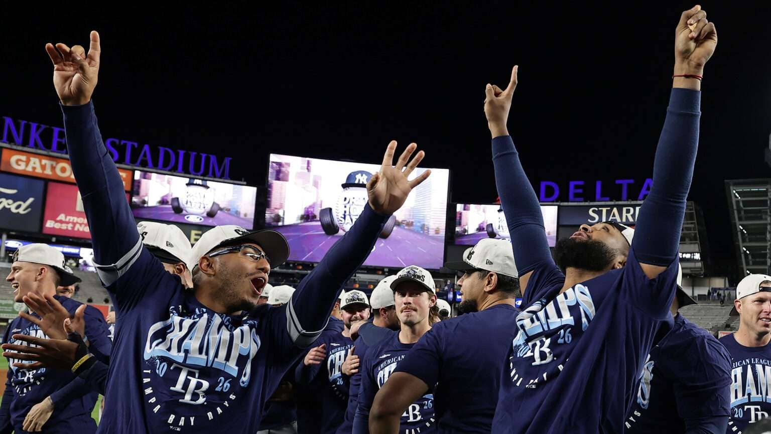 Tampa Bay Rays players celebrate their 2026 AL East title after beating the New York Yankees