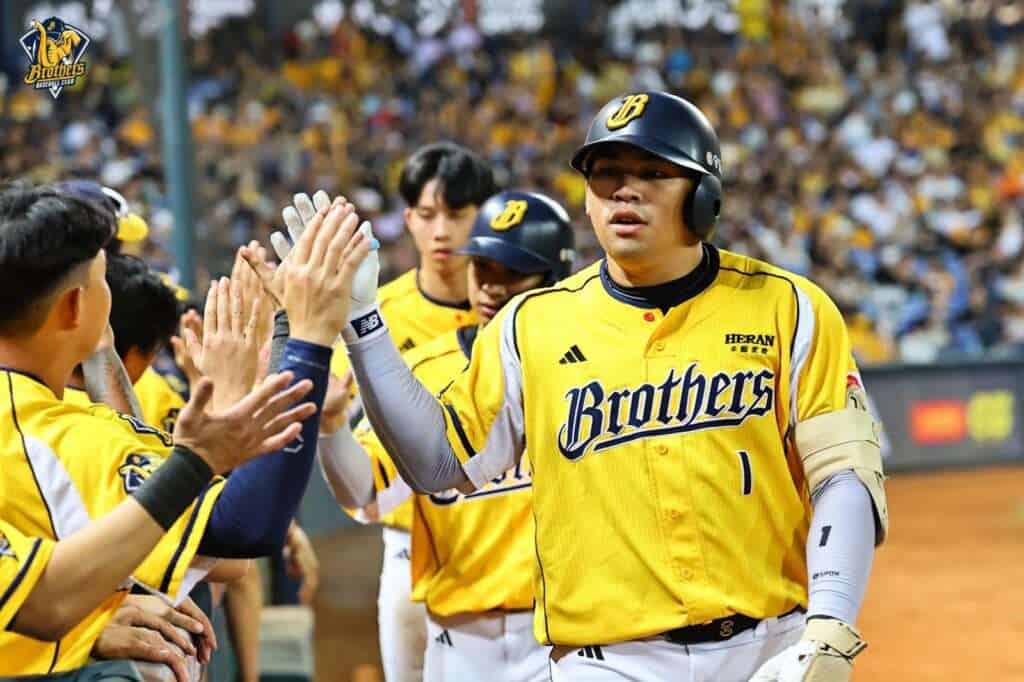 Tseng Sung-en celebrates with CTBC Brothers teammates after setting a CPBL record with nine RBIs against the TSG Hawks
