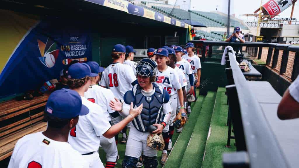USA players exchange high-fives during the WBSC U-15 Baseball World Cup