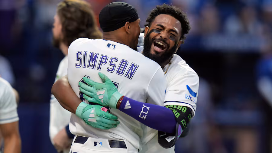 Junior Caminero celebrates after his 40th home run as the Tampa Bay Rays clinch a playoff berth