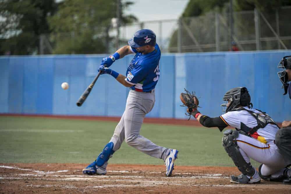 Italy catcher Alberto Mineo bats against Germany in the 2027 Premier12 qualifier