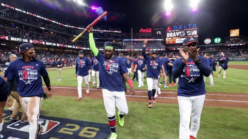 Atlanta Braves players celebrate on the field during the 2026 MLB postseason