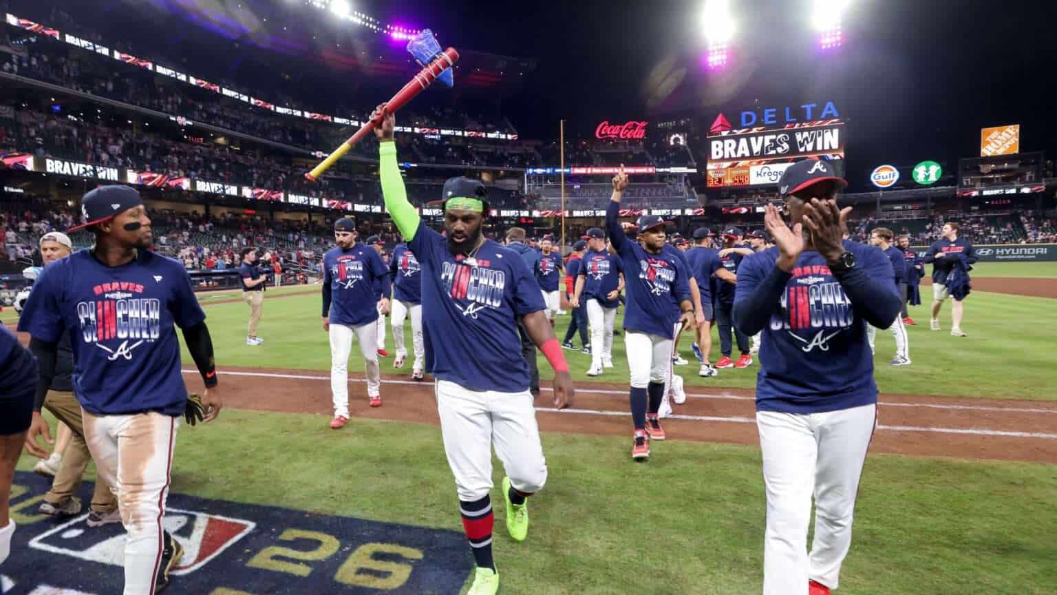 Atlanta Braves players celebrate on the field during the 2026 MLB postseason