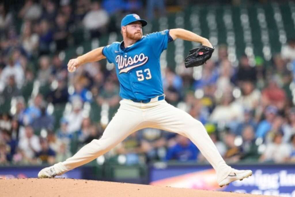 Milwaukee Brewers pitcher Brandon Woodruff delivers a pitch during a 2026 game