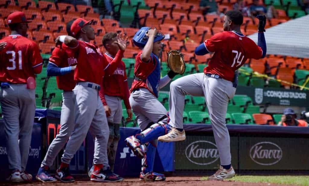 Dominican Republic players celebrate their 7-1 win over Japan at the 2026 WBSC U-15 Baseball World Cup