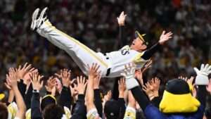 SoftBank Hawks manager Hiroki Kokubo lifted by players after winning the 2026 Japan Series