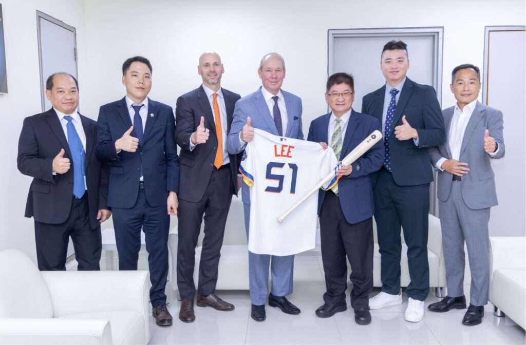 Houston Astros chairman Jim Crane and pitcher Kai-Wei Teng pose with Taiwanese officials at the October 20, 2026 baseball partnership ceremony