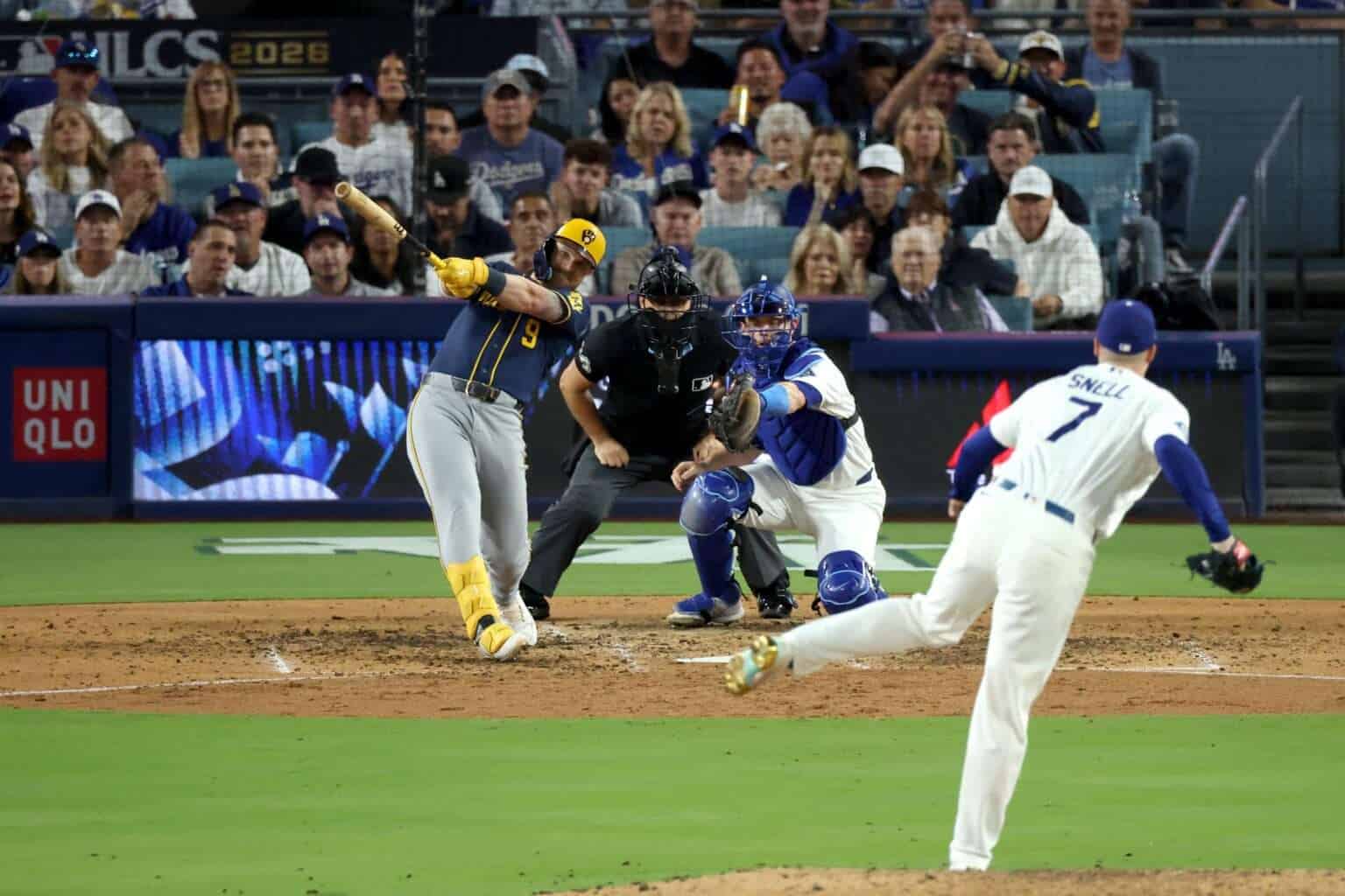 Milwaukee Brewers batter Jake Bauers hits a go-ahead two-run home run against Dodgers pitcher Blake Snell in NLCS Game 3
