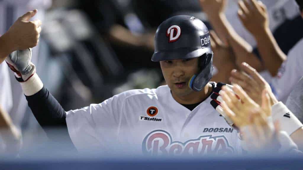 Kang Seung-ho celebrates after his walk-off hit clinched a KBO postseason berth for the Doosan Bears