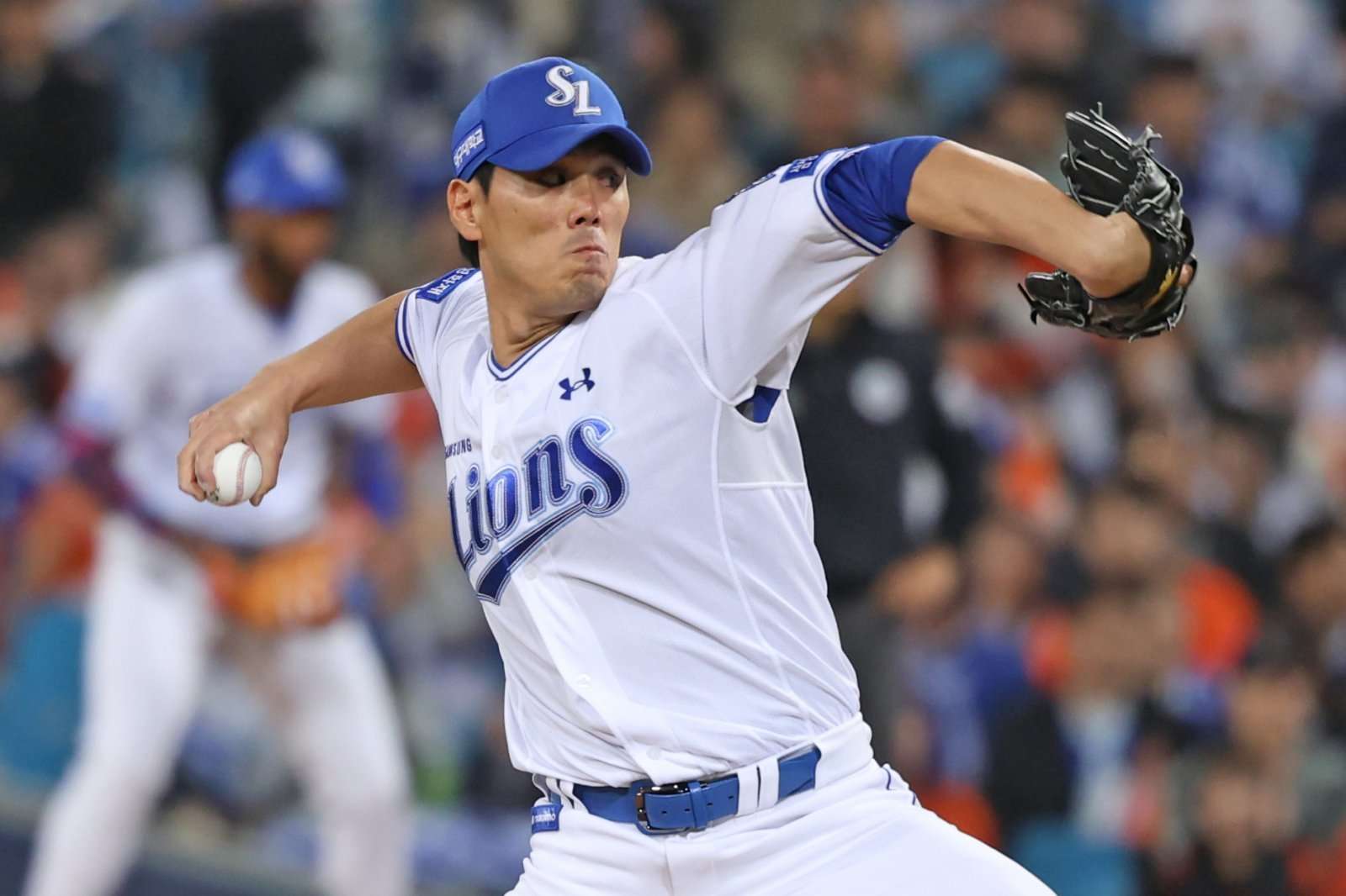 Samsung Lions closer Kim Jae-yoon delivers a pitch in a 2026 KBO League game