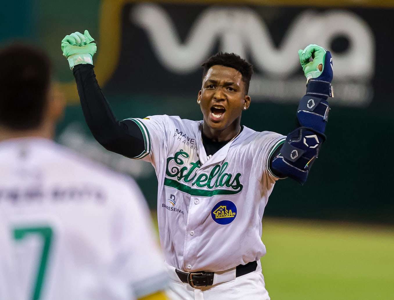 Marco Luciano celebrates after his walk-off single gave Estrellas Orientales a 12-11 win over Gigantes del Cibao
