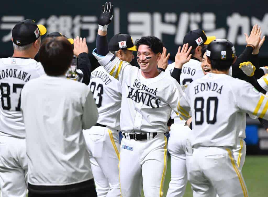 Ryoya Kurihara and the Fukuoka SoftBank Hawks celebrate his walk-off grand slam against the Hokkaido Nippon-Ham Fighters