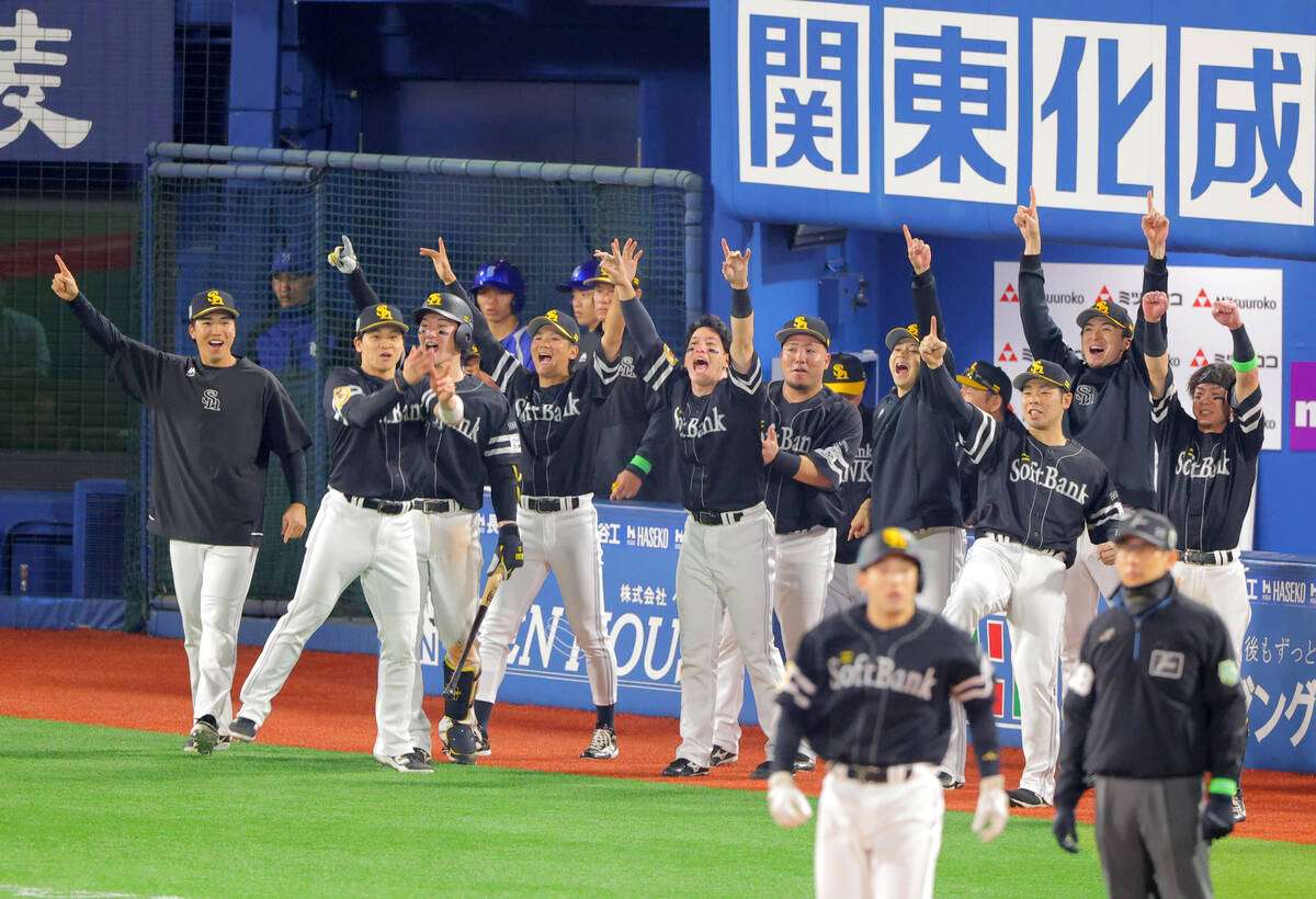Fukuoka SoftBank Hawks players celebrate Yudai Shoji's 11th-inning go-ahead double in Game 1 of the 2026 Japan Series against Yokohama DeNA