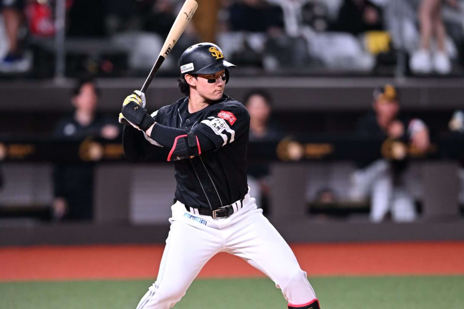 Tomoya Masaki prepares to bat for the Fukuoka SoftBank Hawks during a 2026 exhibition game in Taiwan