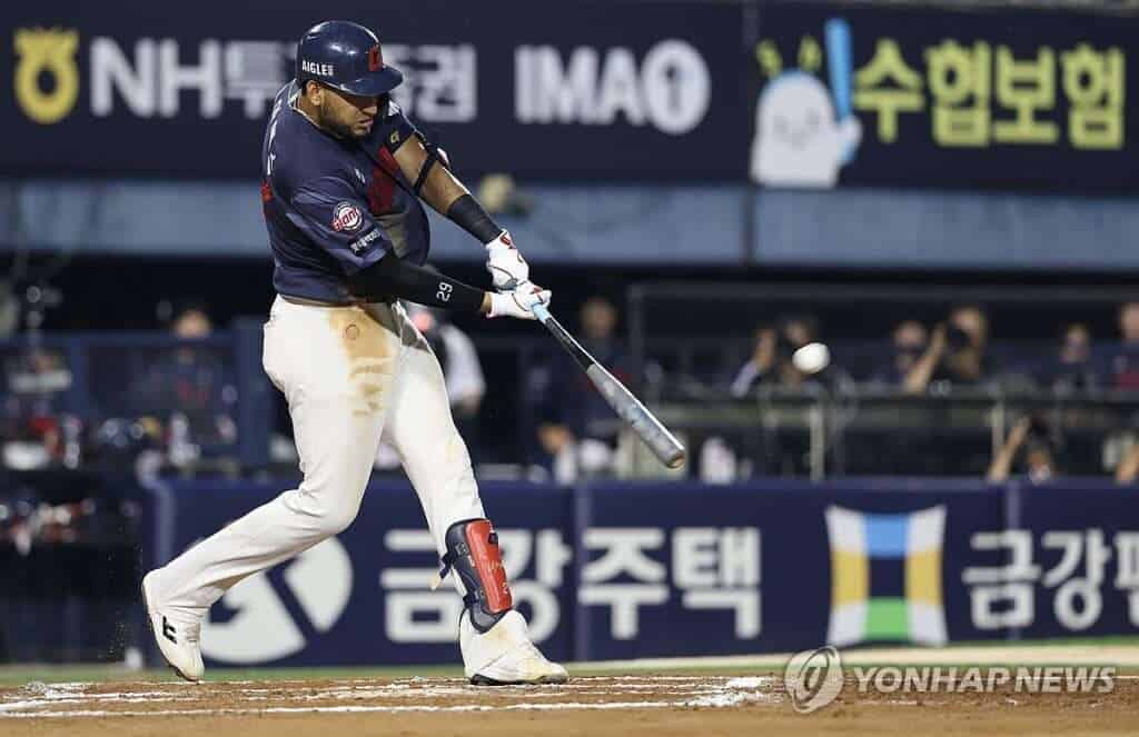 Victor Reyes hits a solo home run for the Lotte Giants against the Doosan Bears during his four-hit season finale on October 12, 2026