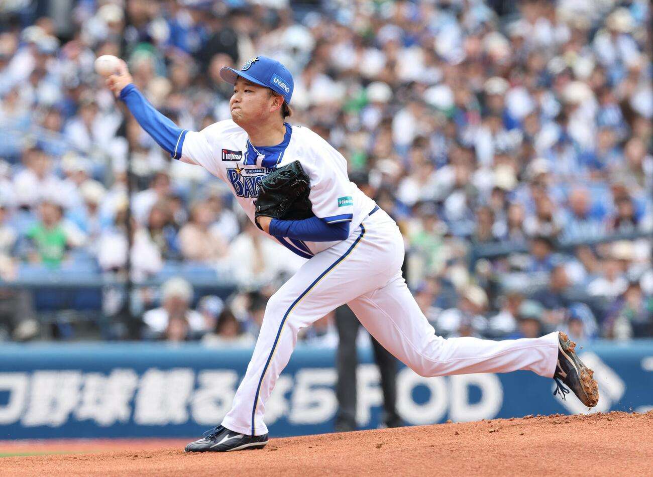 Yutaro Ishida pitches for Yokohama DeNA BayStars in a 2026 NPB game